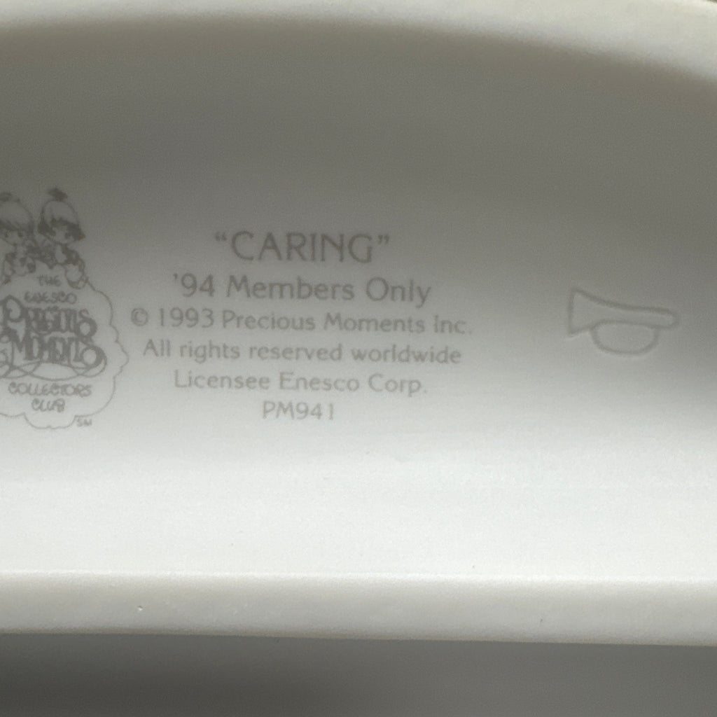 "Caring" Precious Moments Figurine
