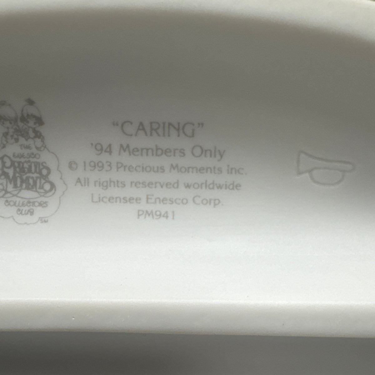 "Caring" Precious Moments Figurine