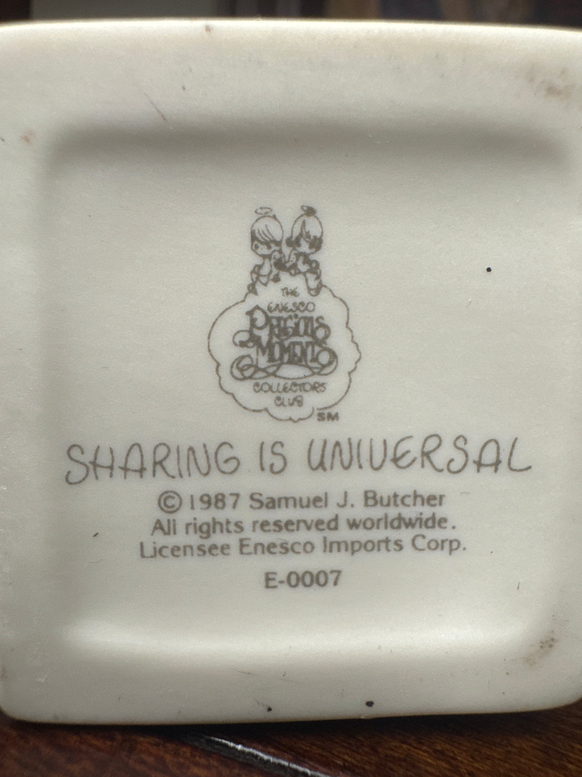 "Sharing is Universal" Precious Moments Figurine