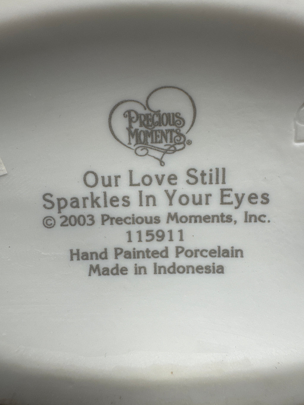 "Our Love Still Sparkles in Your Eyes" Precious Moments Figurine