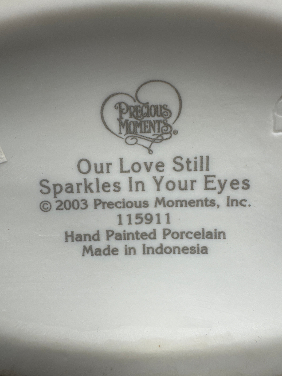 "Our Love Still Sparkles in Your Eyes" Precious Moments Figurine