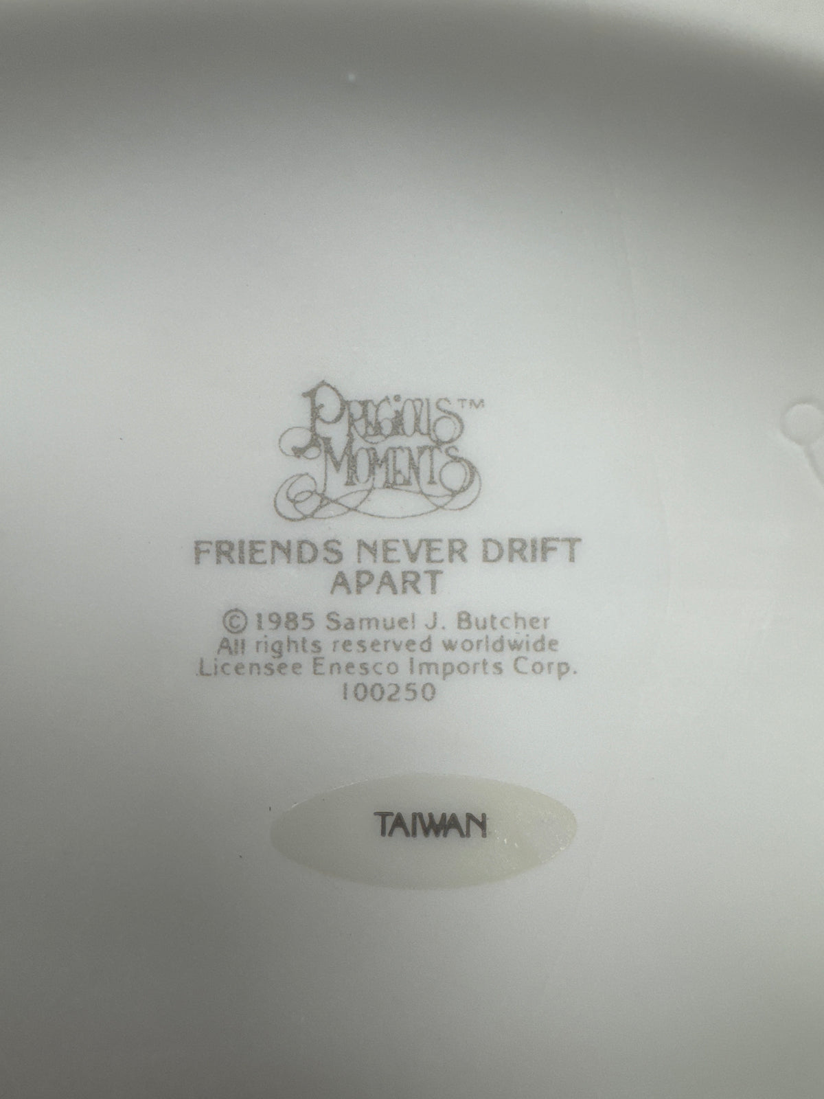 "Friends Never Drift Apart" Precious Moments Figurine