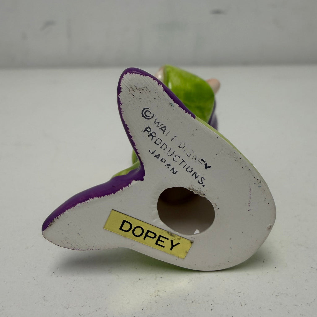 An example of the name sticker on the bottom of each figurine.