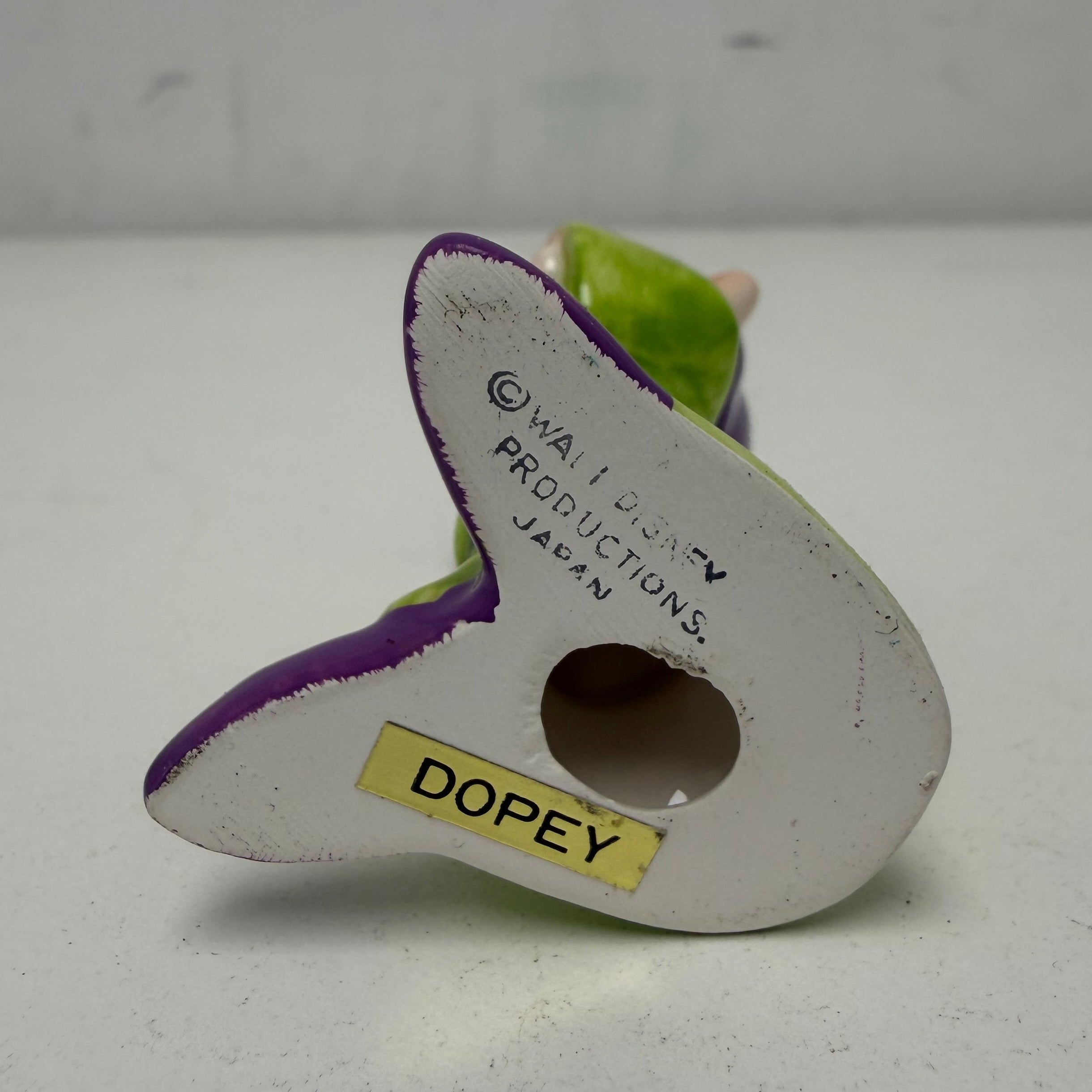 An example of the name sticker on the bottom of each figurine.