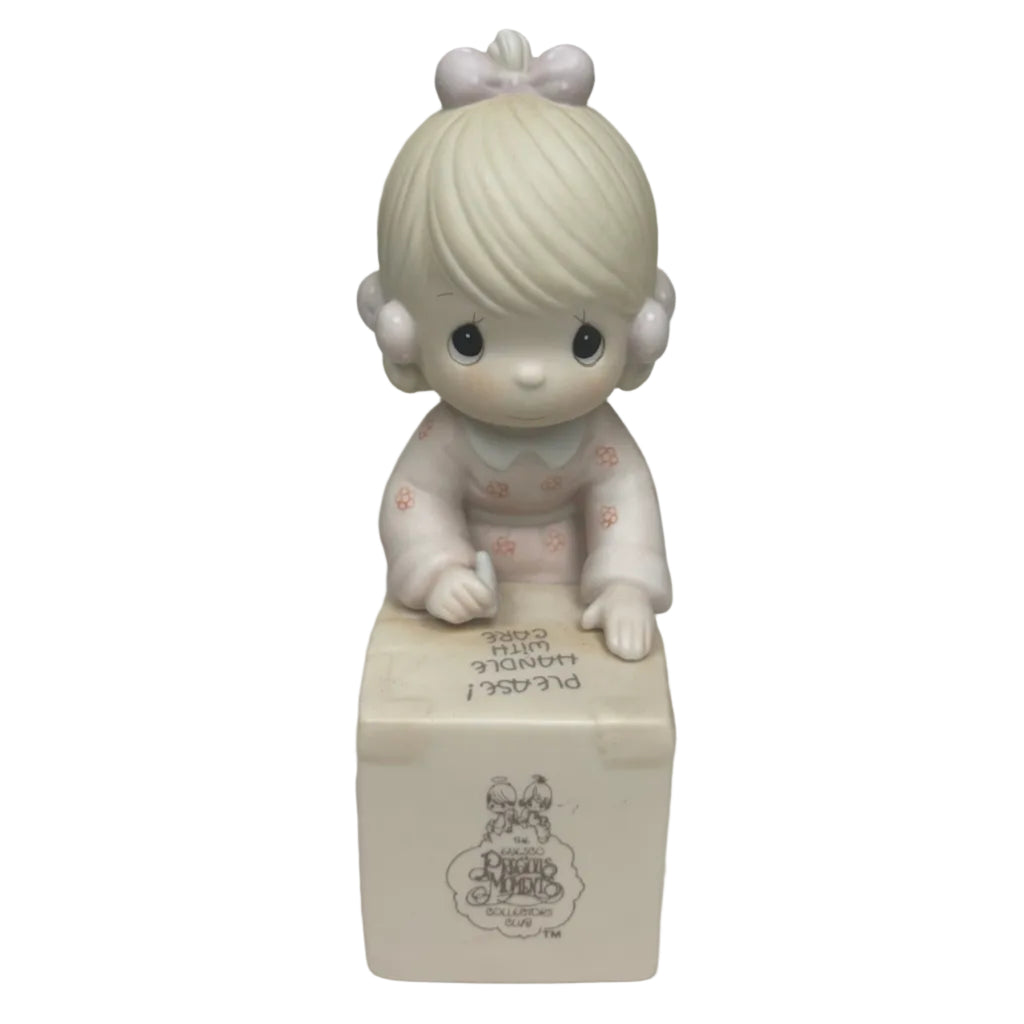 "Sharing is Universal" Precious Moments Figurine
