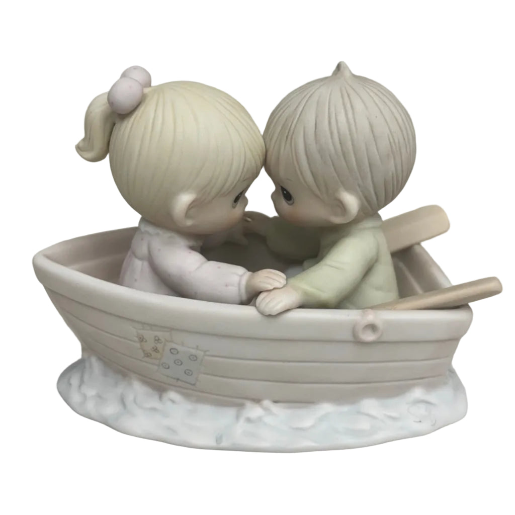 "Friends Never Drift Apart" Precious Moments Figurine