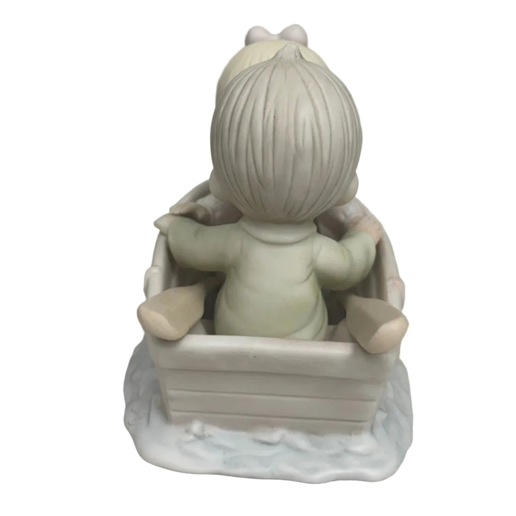 "Friends Never Drift Apart" Precious Moments Figurine