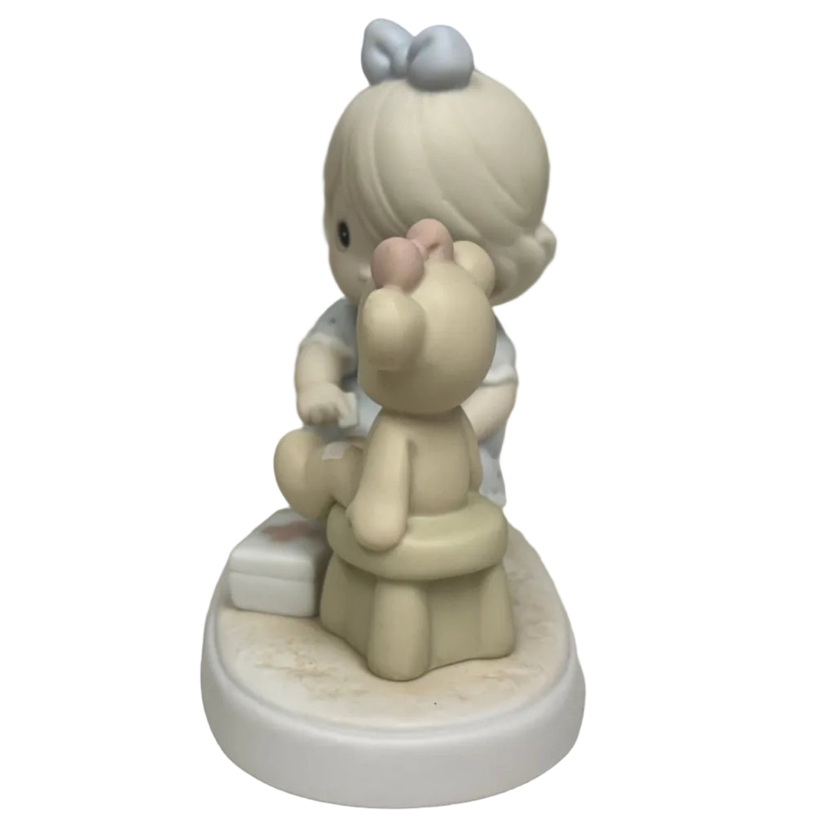 "Caring" Precious Moments Figurine