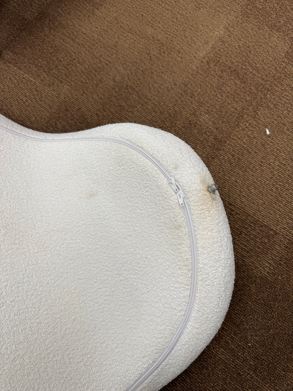 Curved Floor Chair with Faux Shearling Cover in Cream